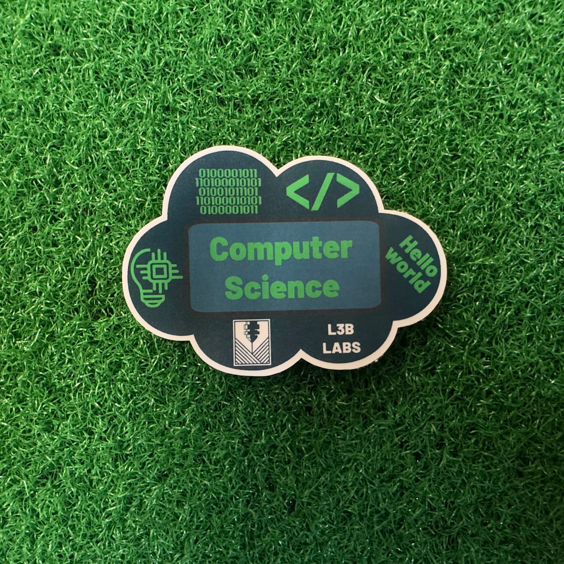 Sticker with 'Computer Science' text on a green grass background