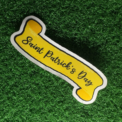 Saint Patrick's Day Scroll Sticker | Golden Banner Decal with Cursive Script | Festive Holiday Decor for Planners, Journals, & Stationery - L3B LABS2 inClear